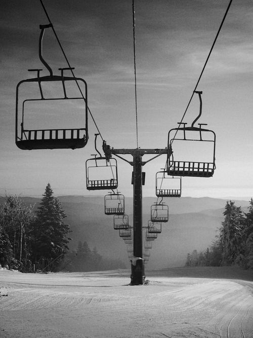 Chairlift over a snowy ski run